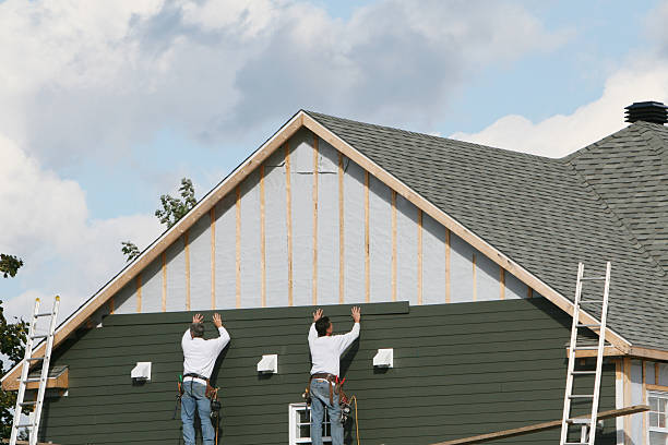 Professional Emergency Siding Repair technician working in Hinckley, IL